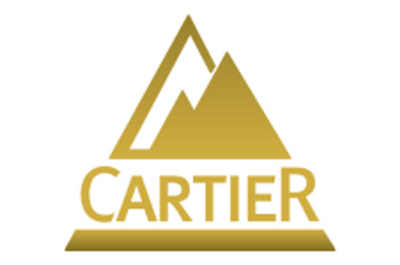 Investor Insight                                
Cartier Resources presents a compelling gold investment opportunity, driven by a growing Abitibi resource, solid institutional support, and upcoming development milestones.
                            Overview                                
Cartier Resources (TSXV:ECR,FSE:6CA) is a Quebec-based gold exploration company advancing a compelling growth story anchored in one of Canada’s most prolific gold regions — the Abitibi Greenstone Belt. With a focused strategy, institutional support and a commitment to innovation, Cartier is building a significant gold resource base while positioning its flagship Cadillac project as an emerging mining camp east of Val-d’Or. As the company transitions from explorer to potential developer, the coming months present multiple catalysts for a significant valuation uplift.
<em><em>Cartier projects in the Abitibi Greenstone Belt in Quebec</em></em>
The Cadillac project has evolved from a single mine project into an emerging gold camp with multiple deposits, advanced resource modeling, and a clear development path. Located in a mining-friendly jurisdiction with existing infrastructure, the Cadillac project is ideally positioned to attract development partners, strategic investments, or acquisition interest from senior producers.
In 2023, using a gold price of US$1,750, Cartier completed a preliminary economic assessment (PEA) which confirmed the project’s robust economics, with a production forecast of 116,900 oz/year over 9.7 years and a low AISC of US$755/oz. 
With permitting pathways de-risked by historical mining activity and extensive drilling already completed, Cartier has launched a fully funded 100,000-metre diamond drilling program. By combining AI and geostatistical reinterpretation techniques with traditional exploration methods, the company is positioning itself at the forefront of modern mineral discovery.
The Cadillac project has all the hallmarks of a high-potential development-stage gold asset: grade, scale, jurisdiction, infrastructure, and strategic backing. Cartier is also actively pursuing parallel value-creation opportunities, including the reprocessing of legacy tailings at the Chimo site and monetization of non-core assets like Wilson, Fenton and Benoist.
                            Company Highlights                                
<strong>District-Scale Gold Project: Cadillac: </strong>Cartier’s core asset consolidates the former Chimo Mine and East Cadillac properties into a district-scale land package on the prolific Larder Lake-Cadillac Fault — host to more than 100 million ounces of historic gold production.
Aggressive Exploration Program: In 2025, Cartier launched a 100,000-meter drill program — one of the largest in the region — to expand its substantial gold resources and unlock Cadillac’s camp-scale potential<strong>.</strong>
<strong>Innovation in Discovery: </strong>The company is leveraging AI-assisted mineral discovery tools, in partnership with VRIFY, to sharpen drill targeting and accelerate new discoveries<strong>.</strong>
<strong>Strategic Partnership with Agnico Eagle: </strong>Agnico Eagle, Cartier’s largest shareholder with a 28 percent equity stake, provides financial strength and validates the company’s assets and strategy<strong>.</strong>
<strong>ESG-Friendly Tailings Reprocessing: </strong>Cartier has introduced a low-capex initiative to evaluate reprocessing 600,000 tons of historic tailings, representing a potential near-term revenue stream with ESG benefits<strong>.</strong>
<strong>Attractive Valuation </strong>With a clean share structure and a market cap of C$52.9 million, Cartier offers significant re-rating potential as exploration and development catalysts unfold.
                            Key Projects                                
Cadillac Project
The company’s flagship Cadillac project is a consolidated land package totaling 11,525 hectares, located along a 15-kilometre strike of the Larder Lake–Cadillac Fault (LLCF) — one of the most productive gold-bearing structures in Canada. This fault zone has historically produced over 100 million ounces of gold across multiple camps. Cartier’s land package includes the past-producing Chimo Mine (379,012 oz gold from 1964 to 1997), West Nordeau, and several new discovery zones over a 10-km strike length straddling the LLCF.
Cartier has completed four mineral resource estimates (MREs) between 2019 and 2022. The most recent, published in May 2023, outlined 7.1 million tons (Mt) @ 3.1 grams per ton (g/t) gold (720,000 oz) indicated and 18.5 Mt @ 2.8 g/t gold (1.63 Moz) inferred. The PEA evaluated an underground mining operation fed from three primary zones (Chimo, East Chimo, West Nordeau), with a 2.9-year payback on a C$341 million capex. The PEA assumes an average head grade of 3.0 g/t gold and annual production of 116,900 oz gold. Infrastructure advantages include an existing shaft, power line and permitted tailings facility.
Cartier Resources has commenced its fully funded 100,000-metre drill program at the Cadillac Project in Quebec, the largest ever on the property. The 18-month campaign is designed to both expand known gold zones and test new high-priority targets along the Cadillac Fault Zone. With $11 million in cash and no debt, Cartier is well positioned to advance Cadillac’s district-scale gold potential.
Chimo Tailings Project
As part of Cartier’s sustainability-focused development strategy, the company is evaluating the potential for reprocessing approximately 600,000 tons of historical tailings deposited during the Chimo Mine operations. This project could unlock near-term, low-cost production with a minimal environmental footprint. Cartier will launch metallurgical characterization to assess gold recovery potential and economic viability. The project benefits from proximity to several underutilized gold mills in the Val-d’Or region, potentially enabling toll milling agreements.
<em><em>Other Projects: Wilson, Fenton and Benoist</em></em>
Cartier also holds 100 percent ownership of three additional gold projects — Wilson, Fenton and Benoist — all located within the Abitibi Belt and each hosting historical gold mineralization or compliant resources. The Wilson Project (1,750 ha, three zones), Fenton (671 ha, 12 zones) and Benoist (3,086 ha, two zones) are currently available for joint ventures or sale. These assets offer significant exploration upside and optionality, allowing Cartier to remain focused on Cadillac while preserving long-term value.
                            Management Team                                
Philippe Cloutier – Founder, President, CEO and Director
Philippe Cloutier is the founder and driving force behind Cartier Resources. A professional geologist with over 35 years of experience in the exploration and development of precious and base metal deposits, Cloutier has a deep technical understanding of the Abitibi Greenstone Belt, having spent most of his career advancing projects in this prolific region.
Nancy Lacoursière – Chief Financial Officer
Nancy Lacoursière brings over 20 years of experience in corporate finance, accounting and strategic financial management. She has held CFO and senior finance positions across the natural resources and manufacturing sectors, with a strong focus on Quebec-based operations.
Ronan Déroff – VP of Exploration
Ronan Déroff is a senior exploration geologist and Cartier’s designated qualified person under NI 43-101. With over 15 years of experience in mineral exploration, resource modeling, GIS and project management, Déroff leads the technical execution of Cartier’s exploration strategy. He has overseen the development of multiple MREs and PEAs for the Cadillac project, and played a central role in integrating modern data analysis and AI-assisted targeting into the company’s workflow. He holds a Masters in operations and management of mineral resources (EGERM), from the Université d’Orléans (France).
This post appeared first on investingnews.com